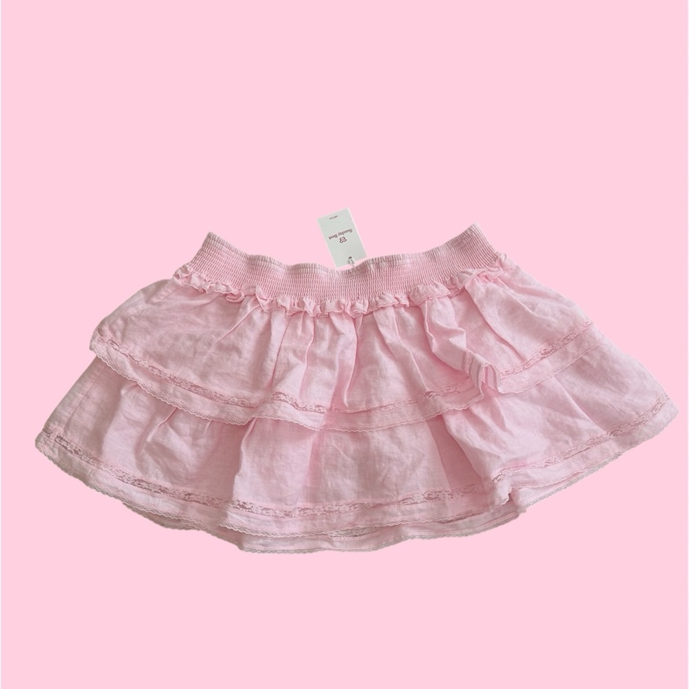 aritzia sunday best pixie linen skirt in villa pink